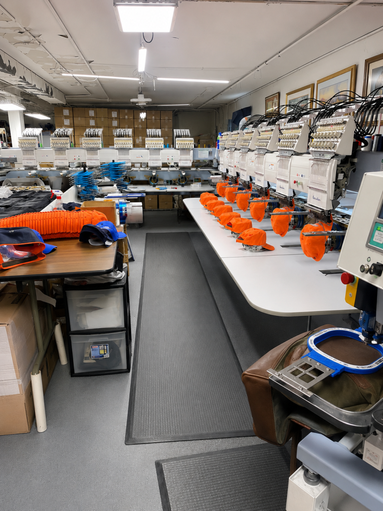 Inside Generation Embroidery's production shop with Barudan embroidery machines in Pewaukee, Wisconsin